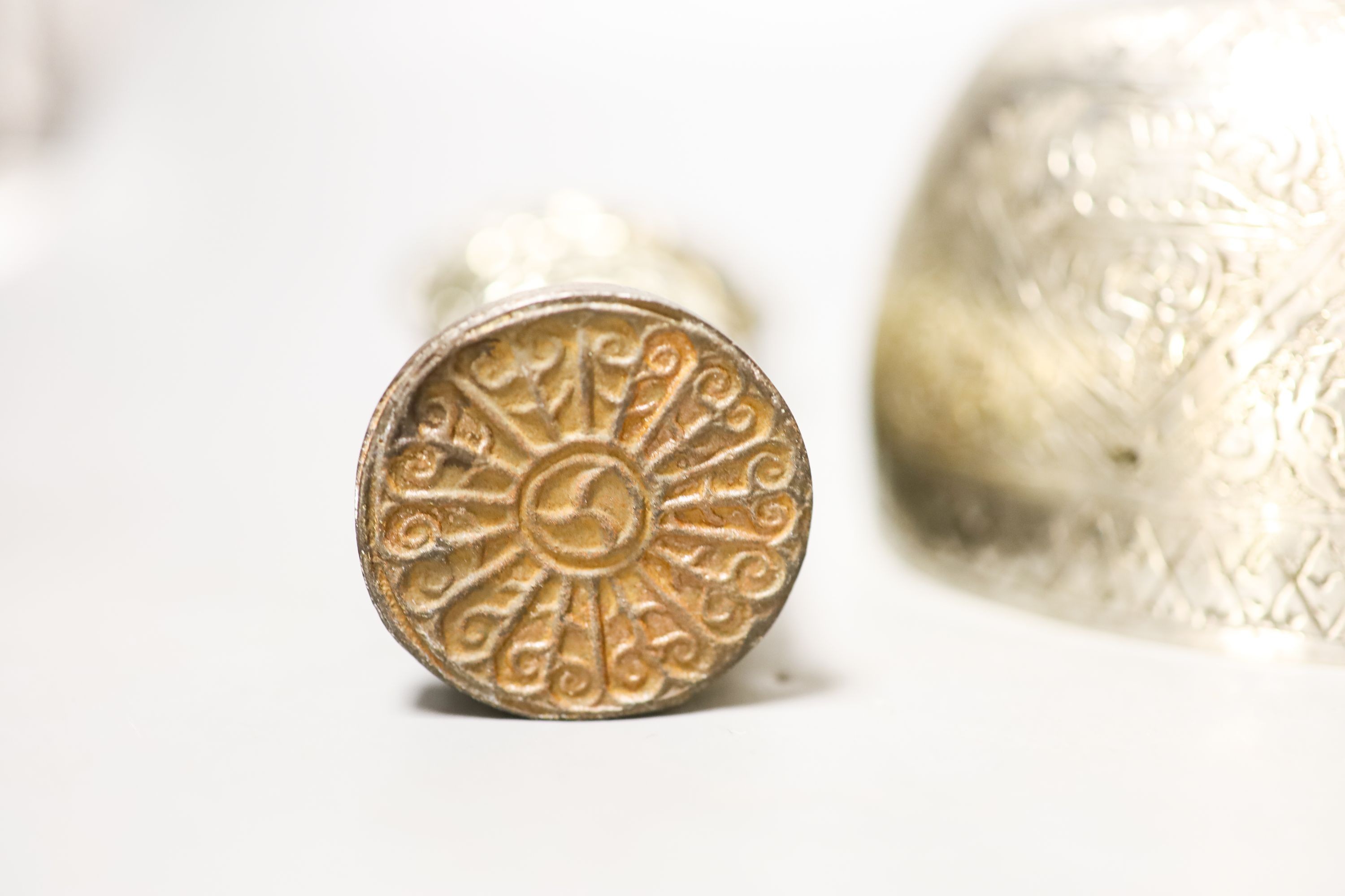 Two Tibetan white metal bowls, similar seal stamp 19cm